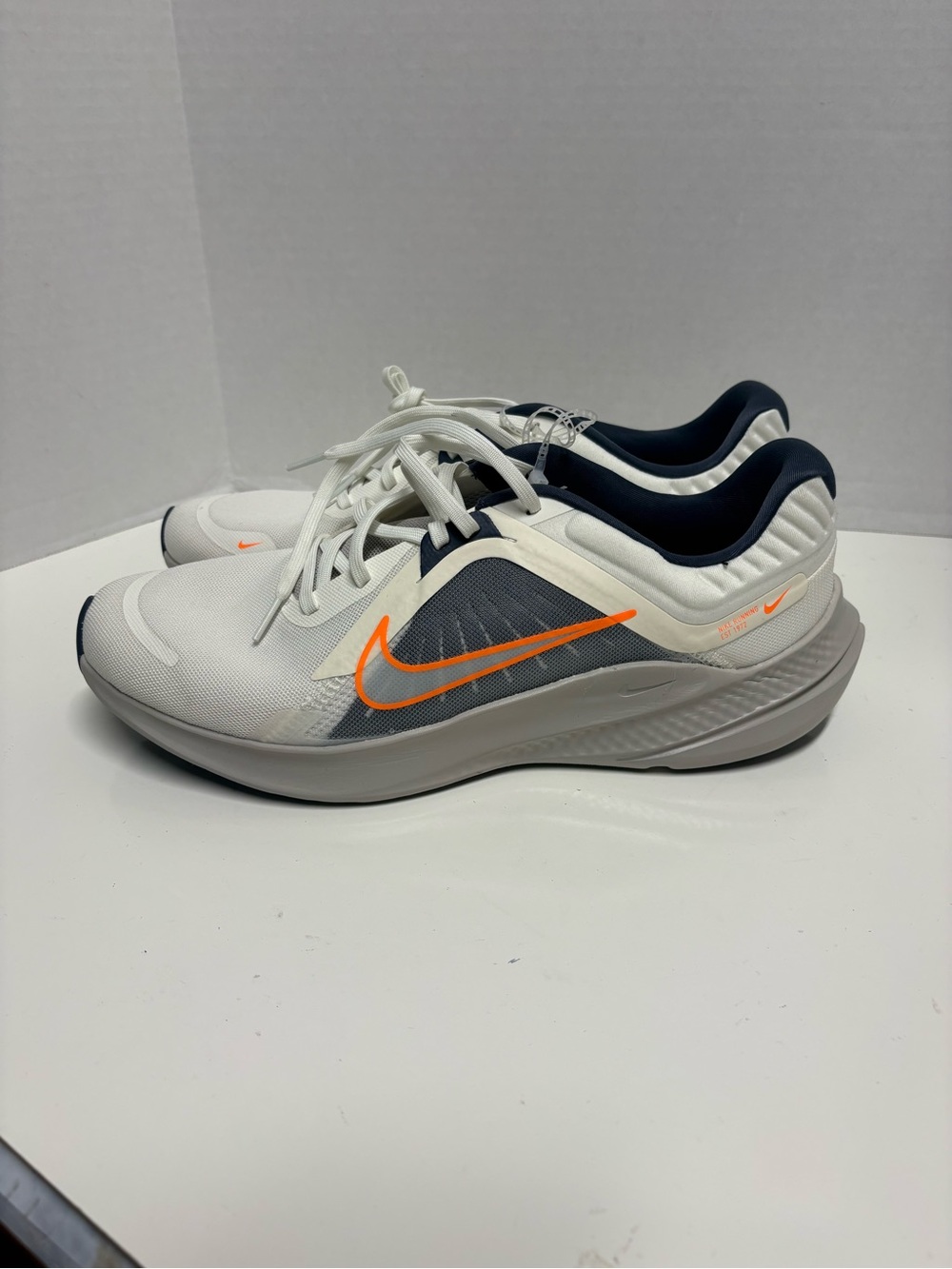 Nike Men's Quest 05 White Navy Running Shoes with Orange Swoosh
